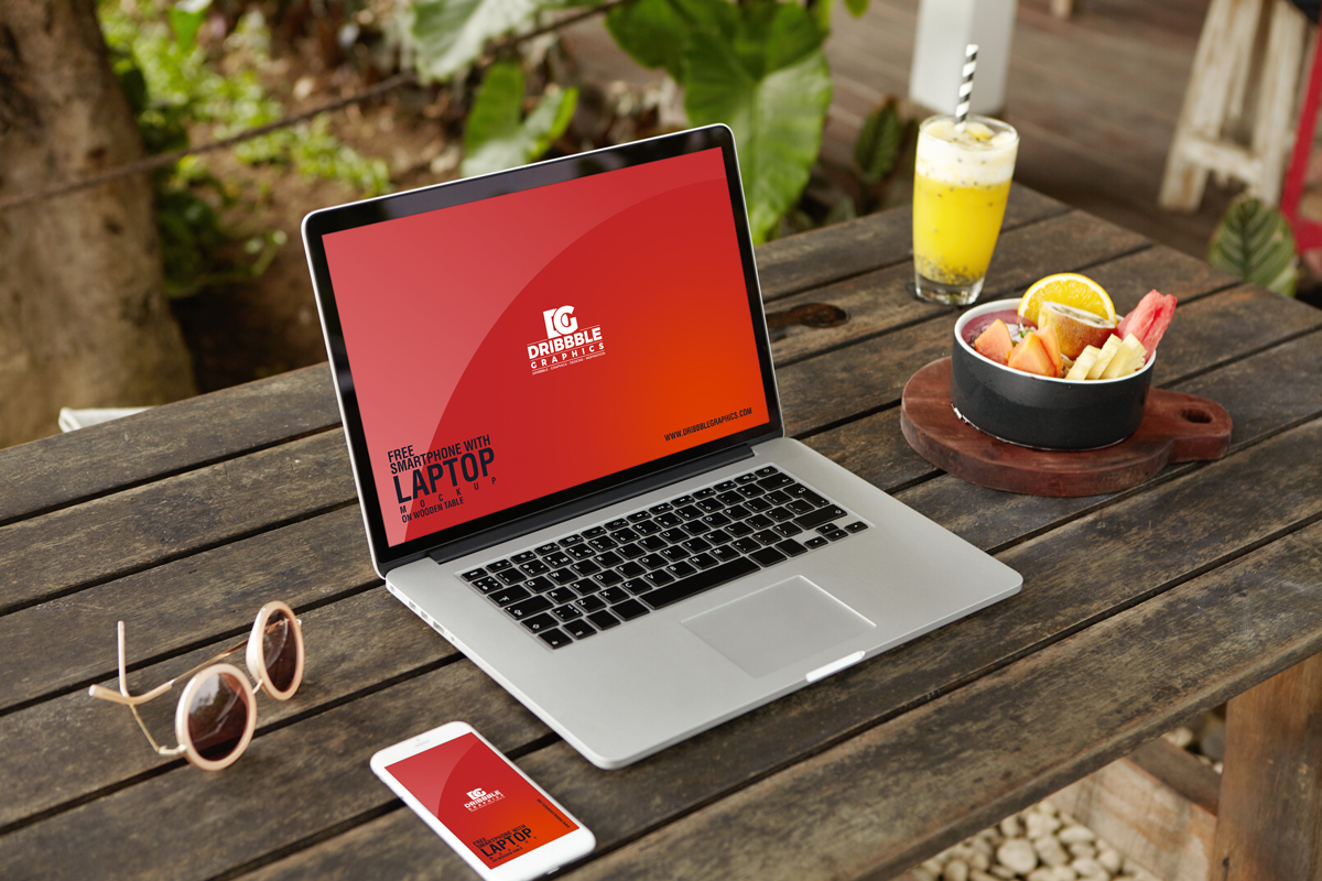 Free-Smartphone-With-Laptop-Mockup-on-Wooden-Table