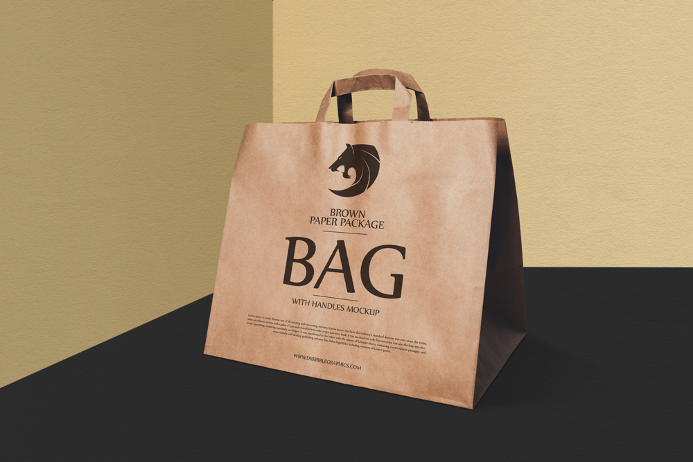 Free-Brown-Paper-Package-Bag-With-Handles-Mockup