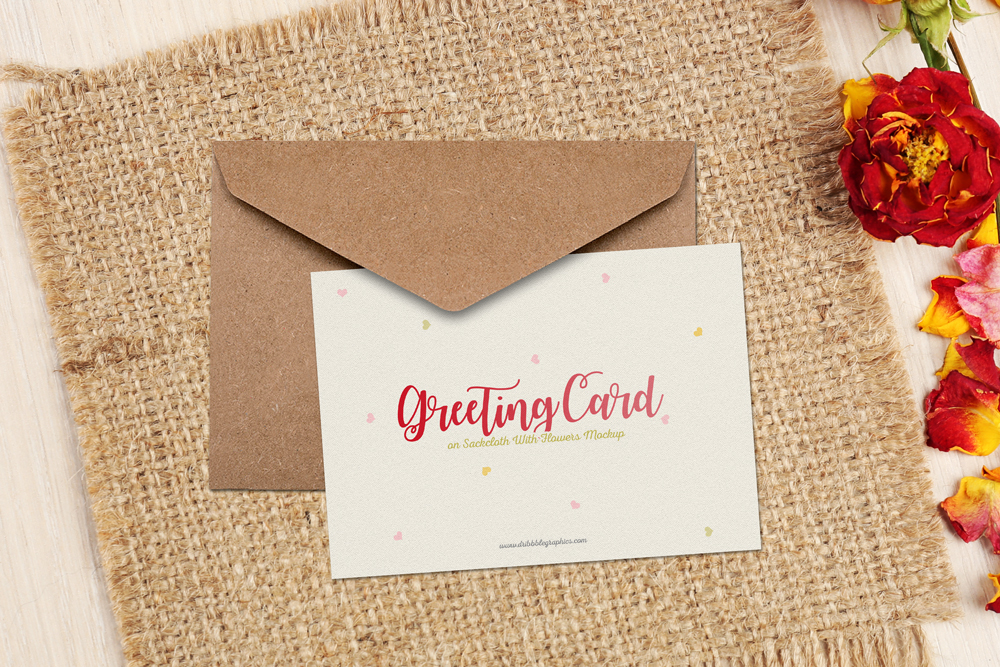 Free-Greeting-Card-on-Sackcloth-With-Flowers-Mockup