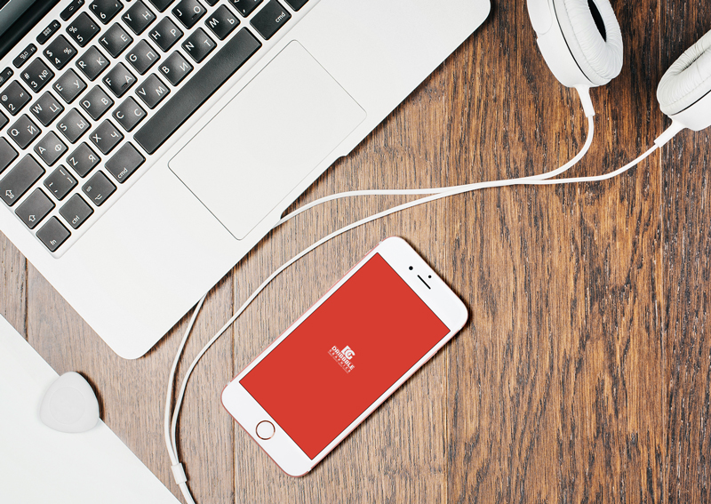 Free-iPhone-7-With-Wooden-Desktop-&-Headphones-Mockup-2018