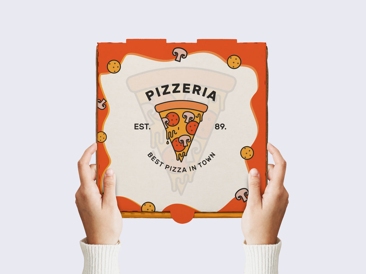 Free-PSD-Pizza-Boy-Holding-Pizza-Packaging-Mockup