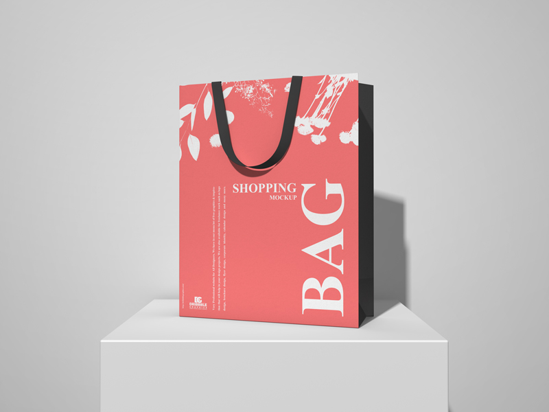 Free-Shopping-Bag-on-White-Podium-Mockup