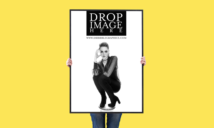 Free-Woman-Showing-Vertical-Poster-Mockup-For-Advertisement-2018-Preview-Image