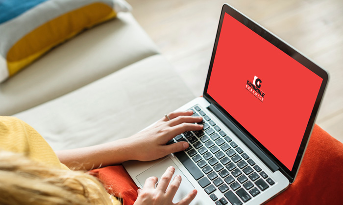 Free-Girl-Working-on-Laptop-Mockup-PSD-300