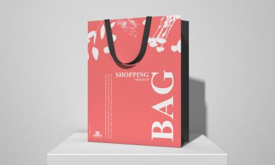 Free-Shopping-Bag-on-White-Podium-Mockup-300